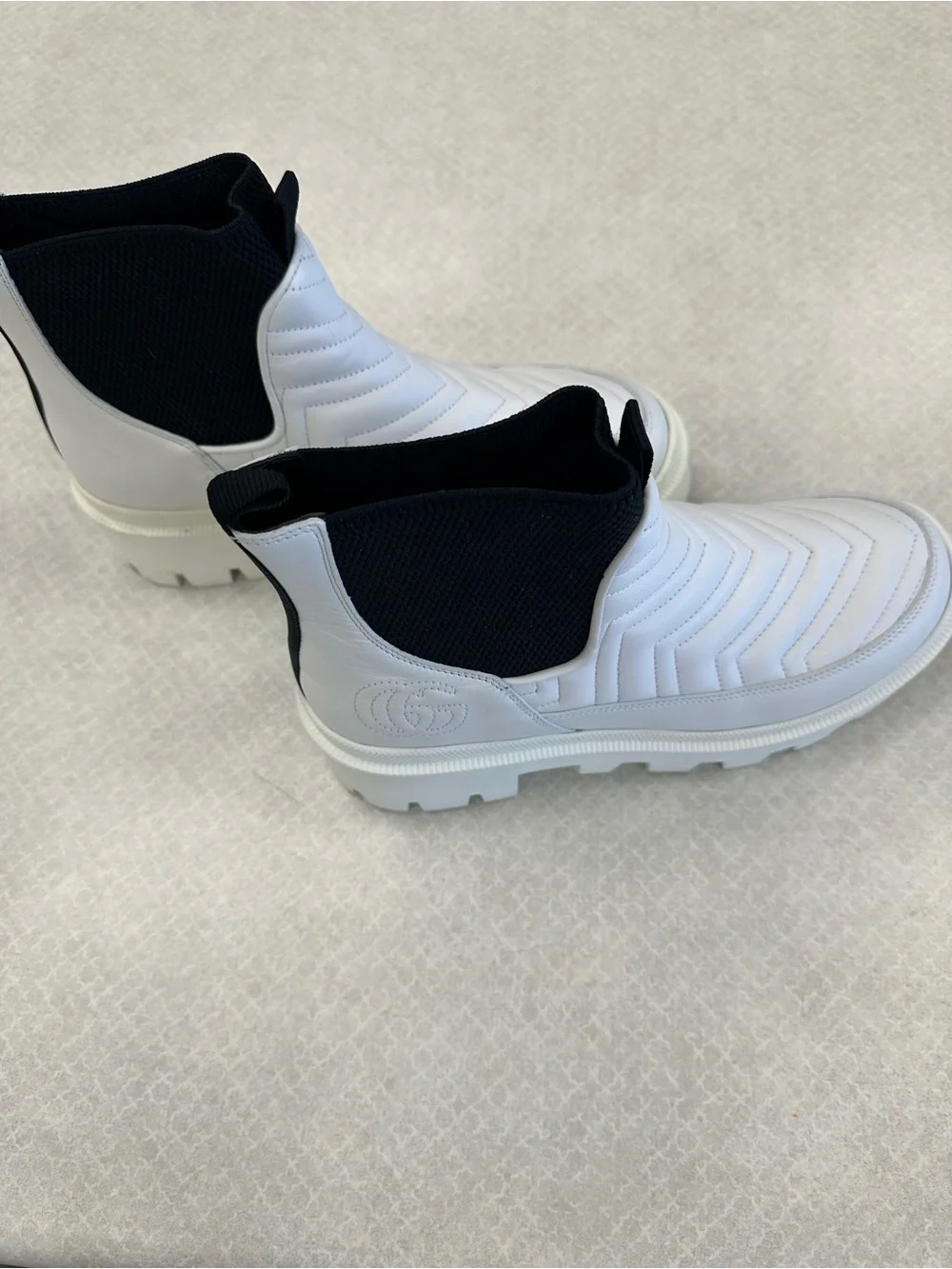 Gucci Women’s White and Black Slip-On Quilted Boots